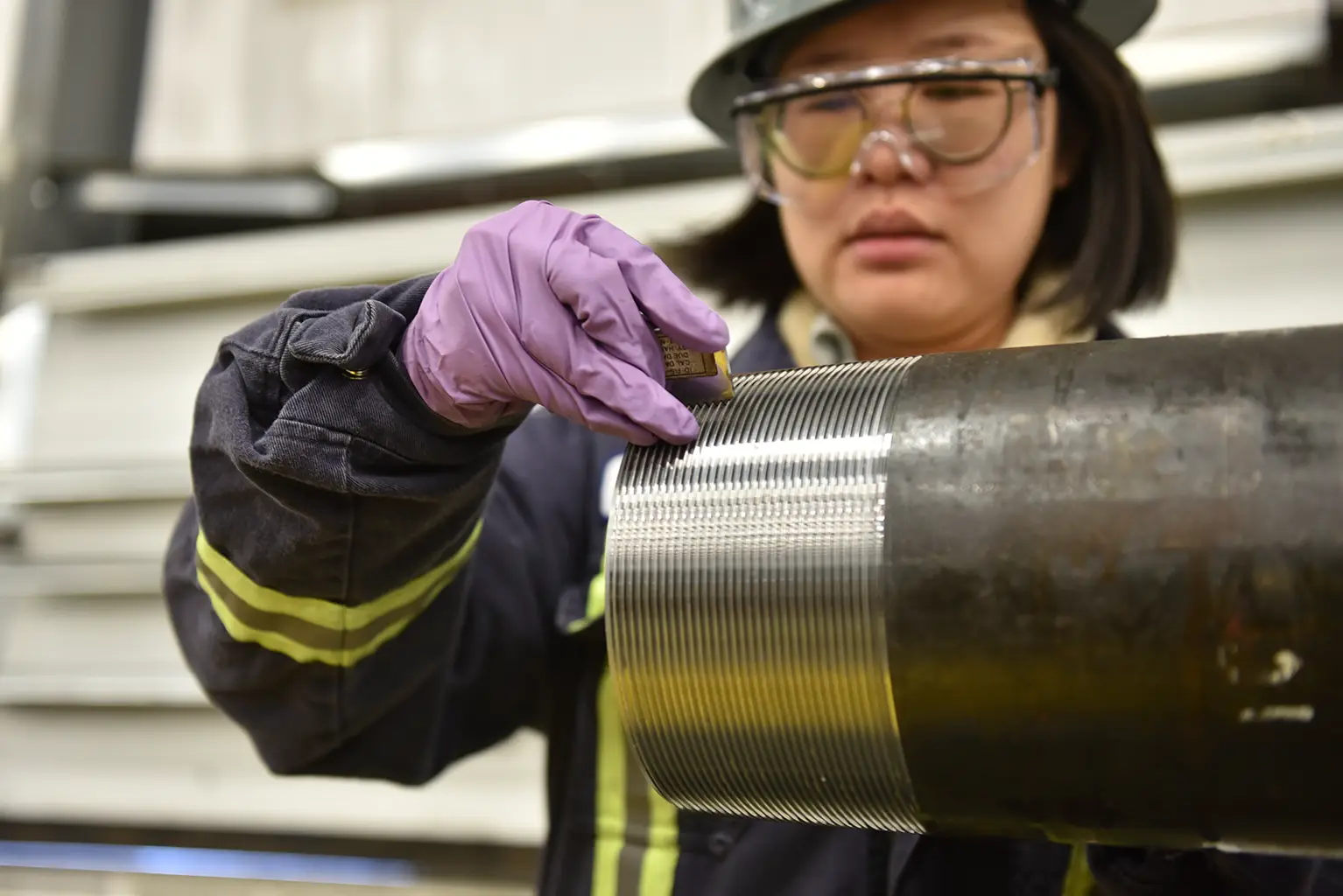 Force Inspection Services OCTG Services women working on pipe